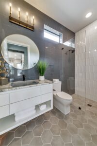 Luxury bathroom with honeycomb floor and marble countertop