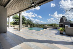 Custom luxury home san antonio patio endless pool landscape fireplace