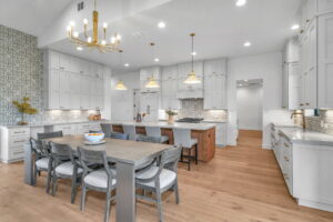 Custom luxury home san antonio kitchen dining room hanging lights hardwood floors