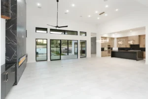 Open floor plan living room and kitchen inside custom-built home in Cantera Hills.