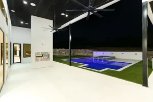 Custom luxury home san antonio patio outdoor fireplace pool fans triple r luxury homes